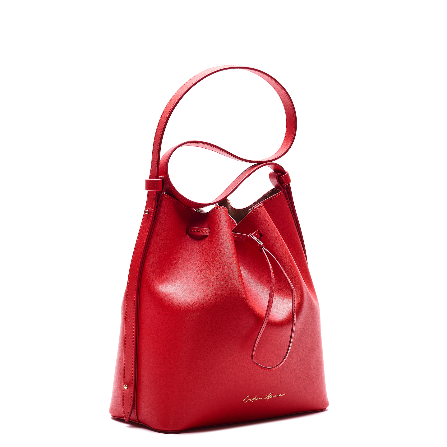 Sandra, crafted by expert artisans at Cristian Marcucci, is the essential, soft, glamorous and timeless bucket bag. It is made of smooth leather and has hand-painted profiles, which adds to its sophistication. The microsuede interior is a luxurious touch .  At Mazzi d Fiori