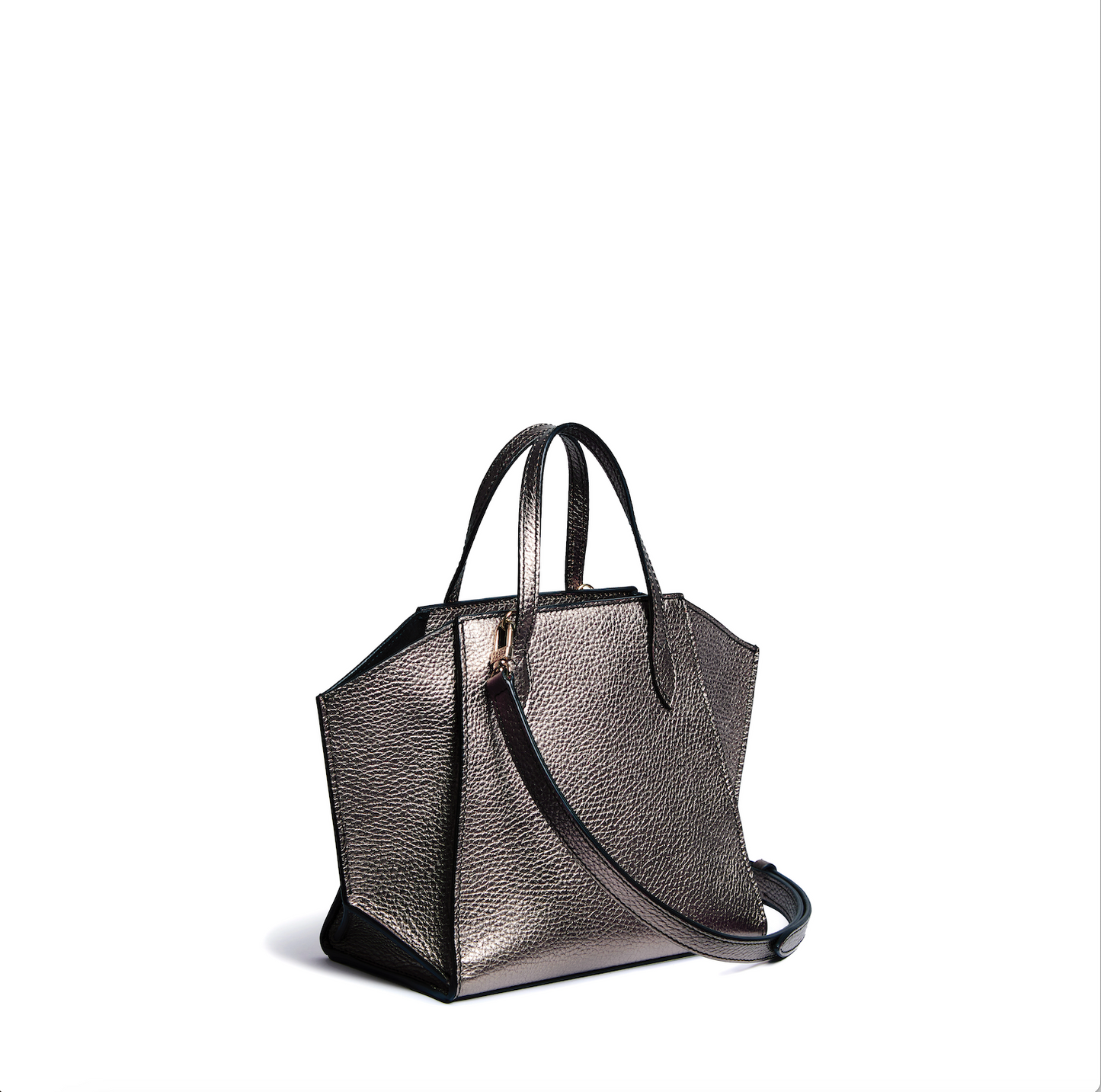 Gemma S, from Cristian Marcucci at Mazzi d Fiori, is a beautiful and versatile mini tote bag. Its refined and elegant design makes it a stylish accessory. The small size allows for easy portability, while the internal pocket and zip fasteners provide convenient storage options. Whether you prefer to carry it by hand or over the shoulder, Gemma offers flexibility in its use. The use of fine leather and soft microsuede interior showcases the bag's high-quality craftsmanship.