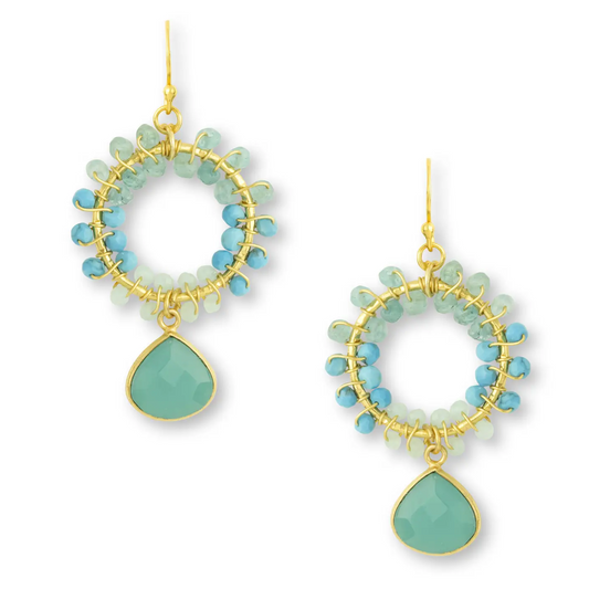 The Talia Aqua Earrings, from Mazzi D Fiori, are expertly crafted with delicate aquamarine beads and a dramatic onyx dropstone. Each hand-looped bead is intricately arranged in a stunning floral design and accompanied by a faceted teardrop gemstone. These earrings are finished with 22 carat gold plating, adding a touch of natural beauty to your look.