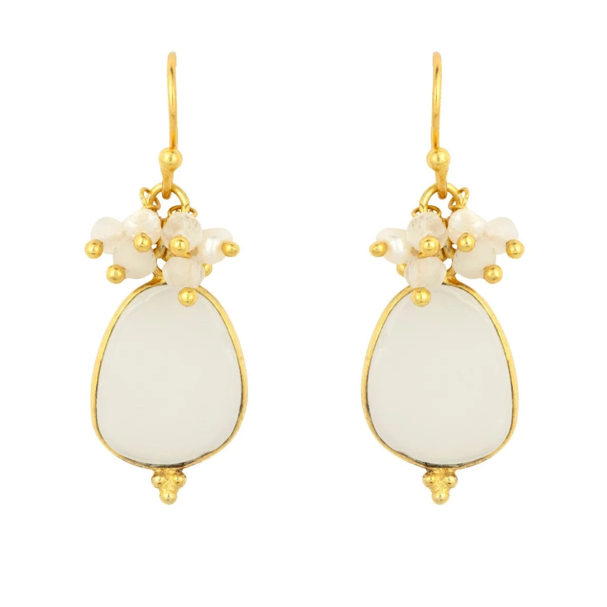 Discover the timeless elegance of our white chalcedony earrings, from Mazzi D Fiori, adorned with a hand-wired cluster of semi-precious stones. This best-selling piece features stunning freshwater pearls and moonstone, finished with an organic-shaped white chalcedony drop. With its striking design and wearability, it's the perfect addition to your jewelry collection for years to come.