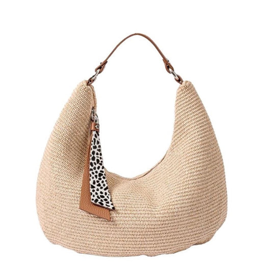The Beatrice Hobo large bag in natural raffia is the cutest bag from Roberta Gandolfi part of the collection by Mazzi d Fiori 